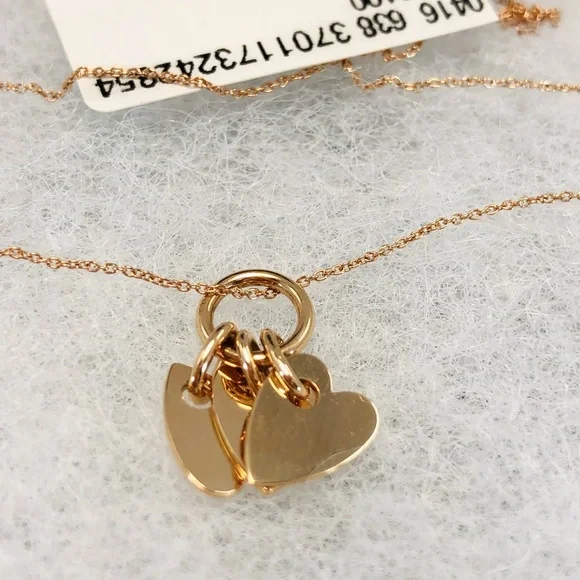 GINETTE NY
Angele 18K Rose Gold 3 Mini Heart Charms 17” Necklace - Picture 7 of 15